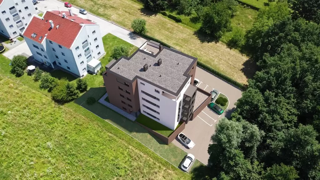 Moderni 3D prikaz stambene zgrade s zelenim okolišem i parkiralištem.